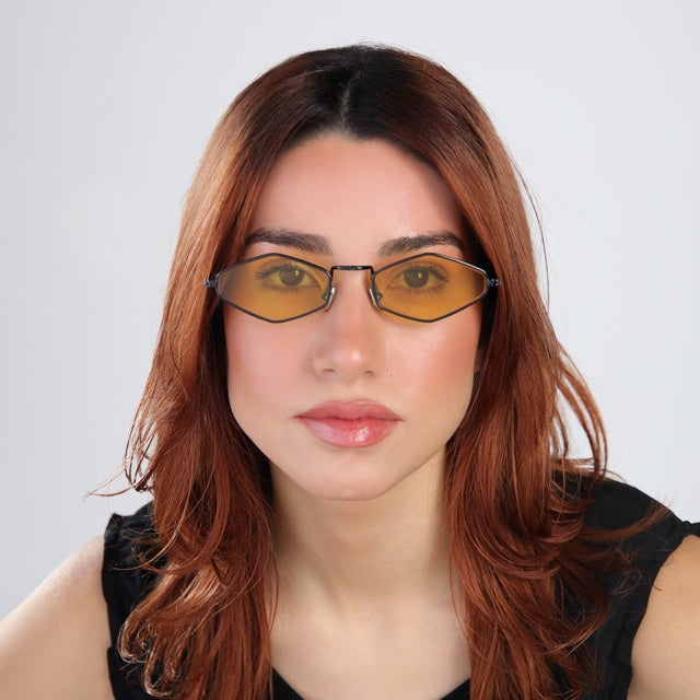 Another angle of woman with red hair wearing Astoria Sunglasses Black with Honey Flat See Through