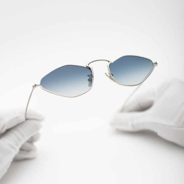 Gloves holding Austria Sunglasses Silver with Midnight Blue Flat Gradient
