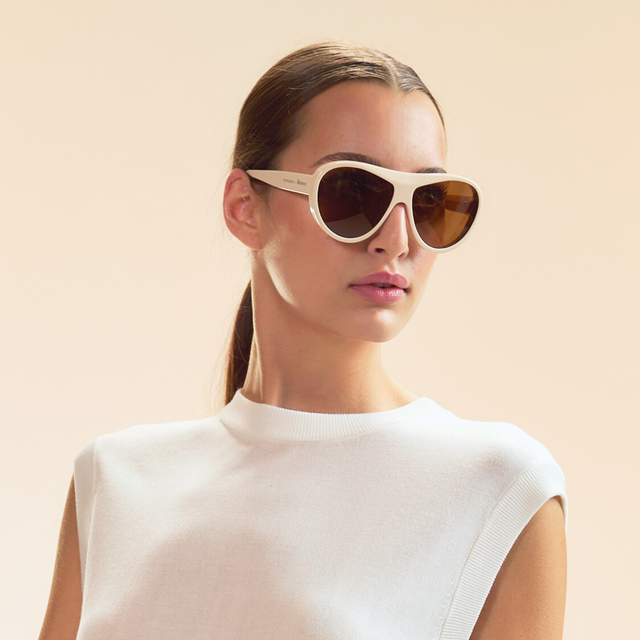 Model for Cynthia Rowley wearing Cynthia Rowley x illesteva Cream with Brown