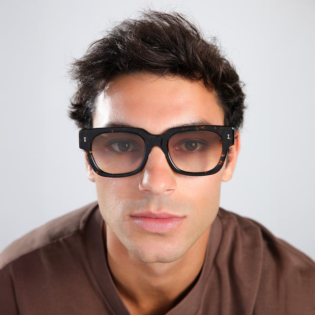 Close up of man in a brown shirt wearing Francesco Sunglasses Flame with Taupe Gradient