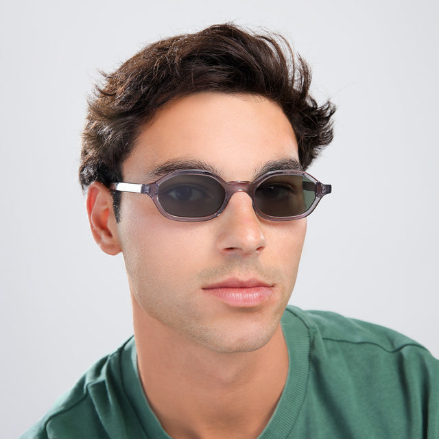 Another angle of man with brown hair in a green shirt wearing Munich Sunglasses Mercury with Olive Flat