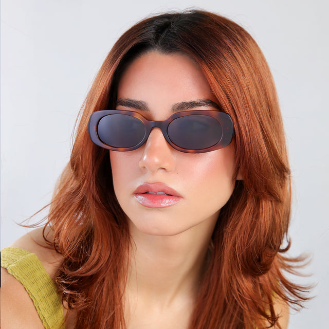 Another angle of woman with red hair Shirley 51 Sunglasses side view in Havana / Grey