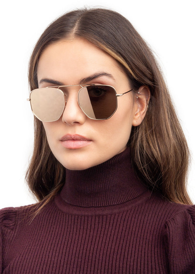 wearing Patmos Sunglasses Rose Gold with Pale Gold Flat Mirror