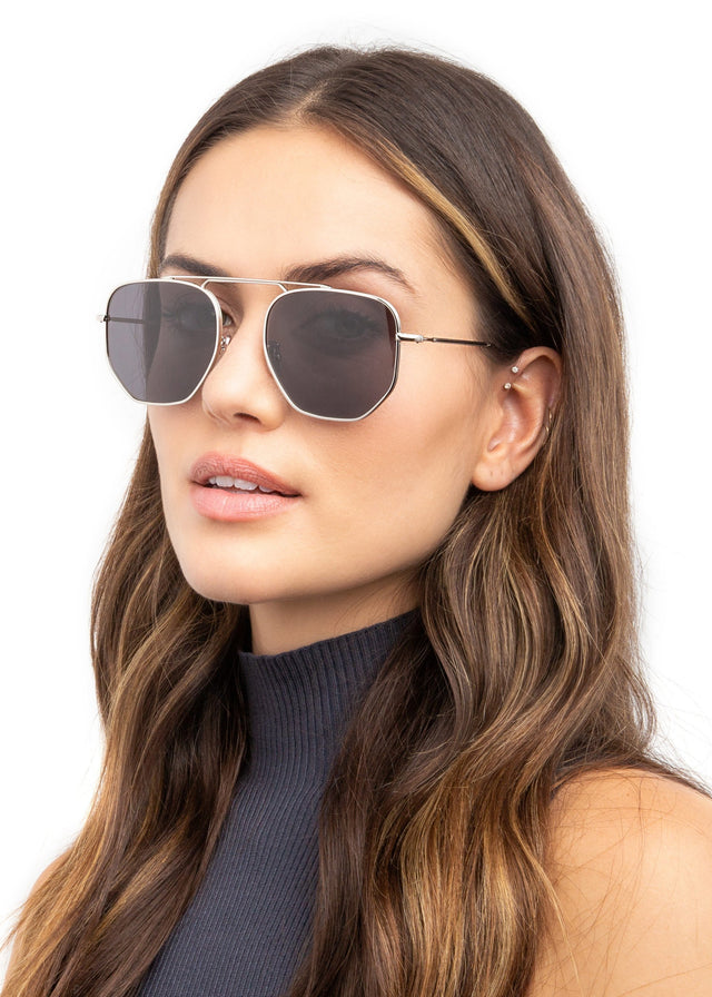 wearing Patmos Sunglasses Silver with Grey Flat