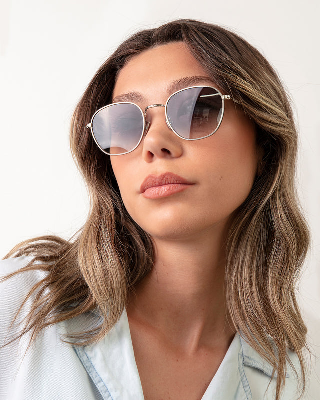 Brunette model with ombre wavy hair wearing Prince Sunglasses Silver with Grey Flat Gradient
