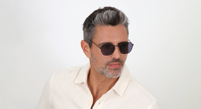 Model wearing Prince Sunglasses in Matte Black