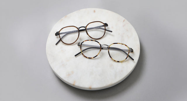 Tompkins Titanium shown in 2 colorways on a marble tray