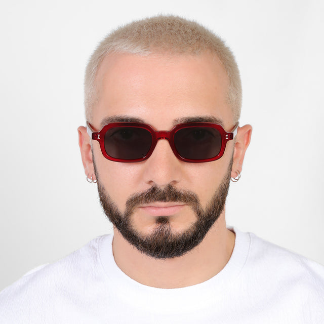 Model with a platinum buzzcut wearing Berlin Sunglasses Mulberry with Grey