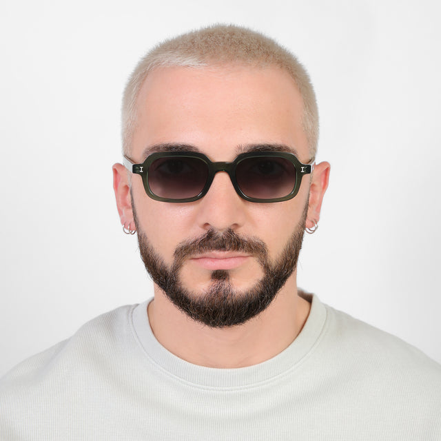 Model with a platinum buzzcut wearing Berlin Sunglasses Pine with Grey Gradient