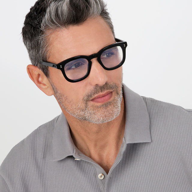 Model with salt and pepper hair and beard wearing Boston Optical Black Optical