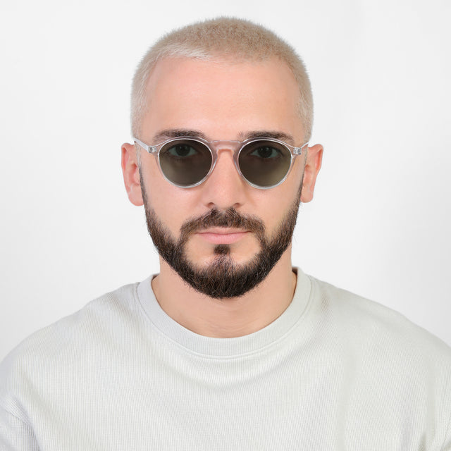 Model with platinum buzzcut wearing Capri Sunglasses Clear with Olive