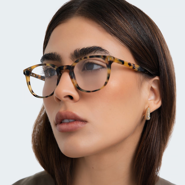 Side angle of woman wearing Copenhagen Optical Tortoise Optical