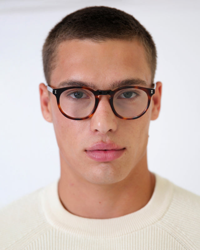 Model with buzzcut wearing Eldridge 48 Optical Havana Optical