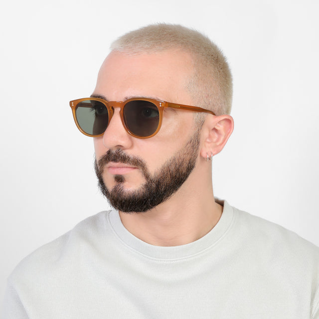 Bearded model looking right wearing Eldridge 56 Sunglasses Honey with Olive Flat