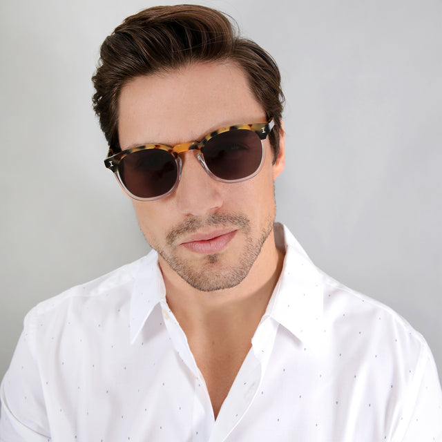 Model with brown hair combed sideways wearing Eldridge Sunglasses H/H Tortoise/Clear with Grey Flat