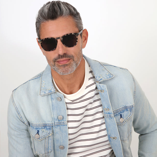 Model with salt and pepper hair and beard wearing Eldridge Sunglasses White Tortoise with Grey Flat