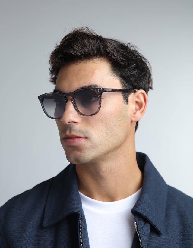 Man in a navy jacket wearing the Eldridge in Mercury