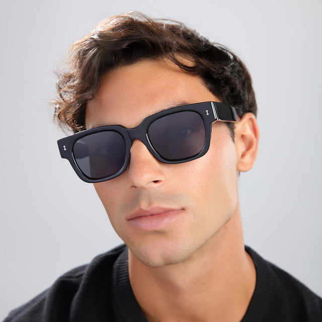 Close up of man in a black shirt wearing Francesco Sunglasses Black with Grey