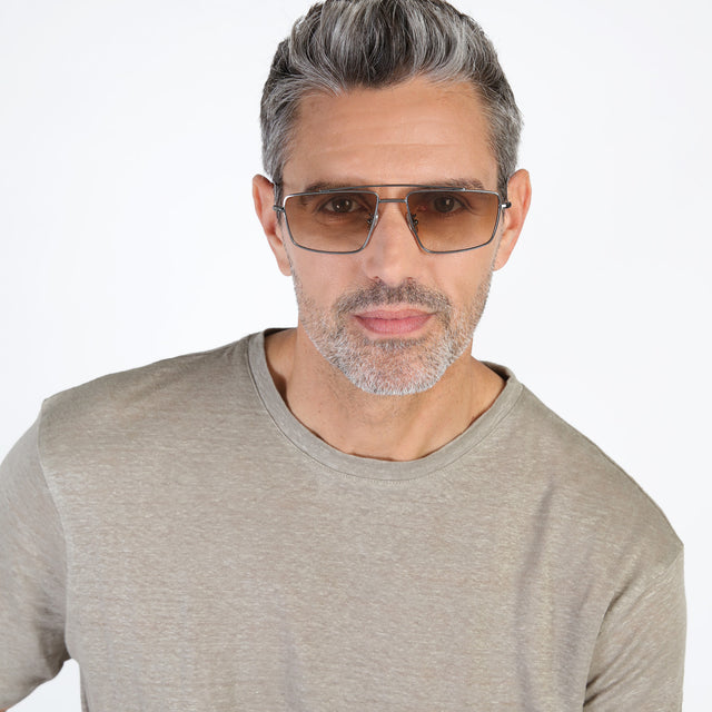 Model with beard wearing Jane Sunglasses Gunmetal with Taupe Gradient