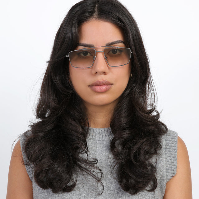 Brunette model wearing Jane Sunglasses Gunmetal with Taupe Gradient