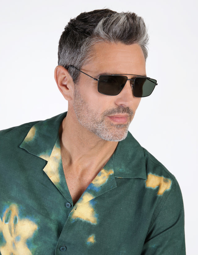 Model with salt and pepper hair and beard wearing Jane Sunglasses in Black with Olive