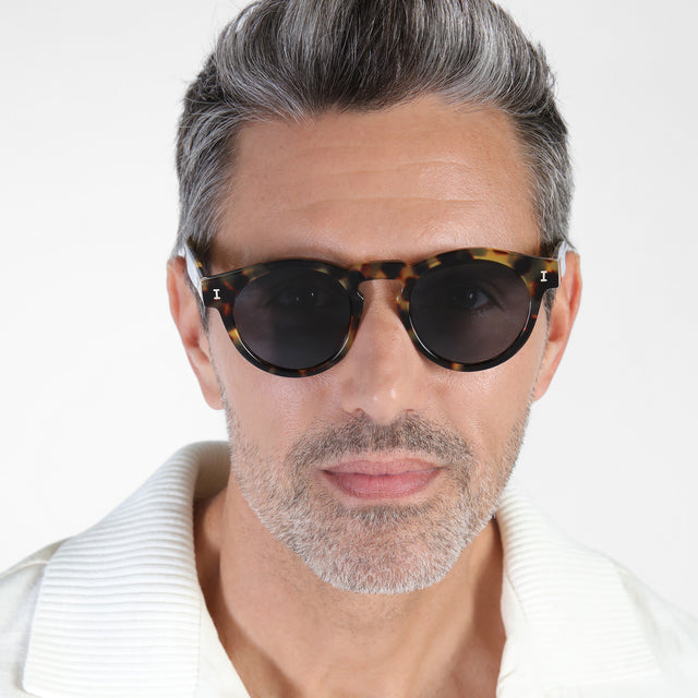 Male model wearing Leonard Sunglasses Tortoise with Grey