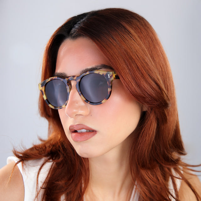 Another angle of woman with red hair wearing Leonard (15 Year Anniversary) Sunglasses Tortoise with Grey