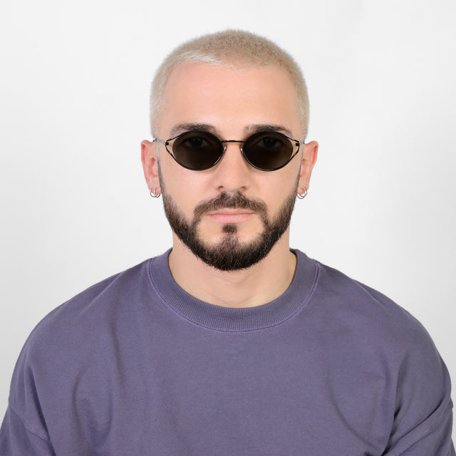 Model with platinum buzzcut wearing Maria Sunglasses Black with Grey