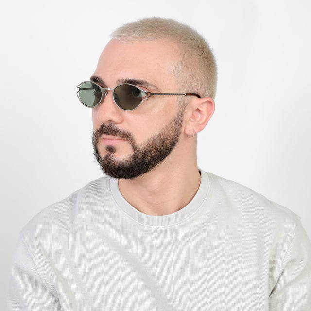 Bearded model looking right wearing Maria Sunglasses Silver with Olive