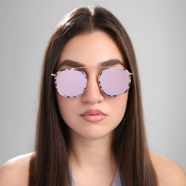 Brunette woman wearing Mykonos Ace Sunglasses White Tortoise/Gold with Bright Rose Flat Mirror