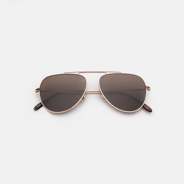 Naxos 58 Sunglasses side view in Rose Gold / Brown Flat