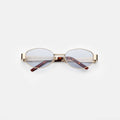 Front view of Nesso Sunglasses in Gold/Light Blue See Through