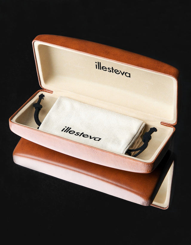 Hard brown eyeglass case with 'illesteva' branding on a black background
