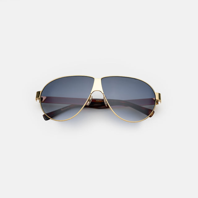 Niki Sunglasses side view in Gold / Navy Gradient