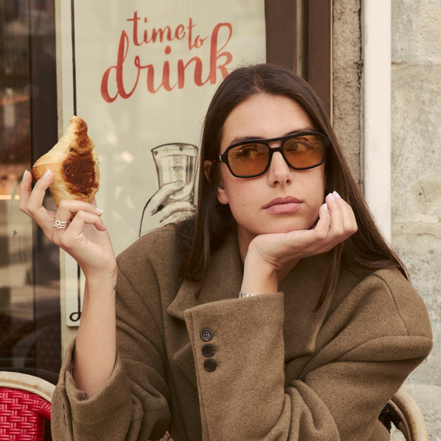 wearing Queens Sunglasses Black with Sunset Flat