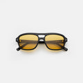 Front view of Queens Sunglasses in Black/Honey Flat See Through