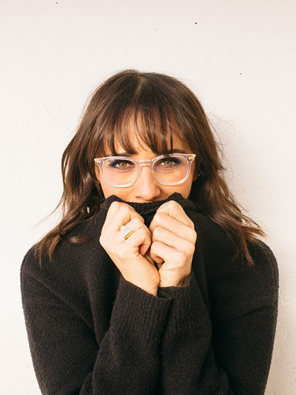 Rashida Jones in a sweater wearing the Rashida Optical by illesteva