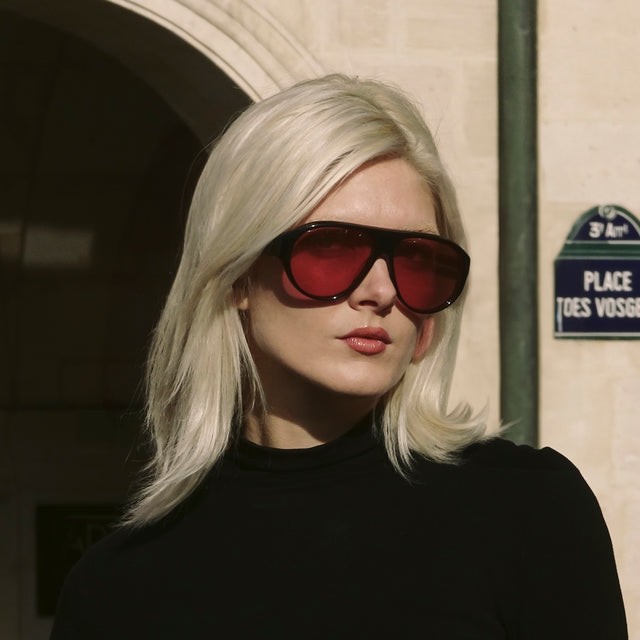 Woman in Paris wearing Telluride Sunglasses Black with Sunset