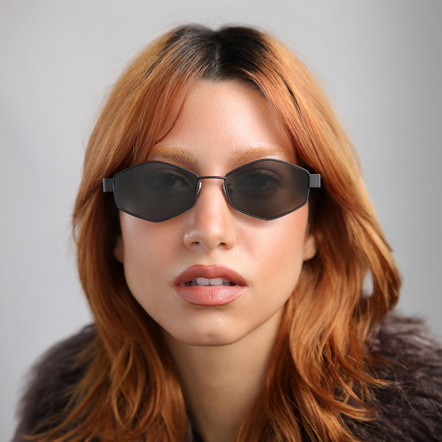 Model with red hair wearing Tucson Sunglasses Matte Black with Grey