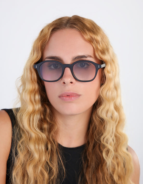 Blonde woman wearing William Matte Black with Taupe Gradient