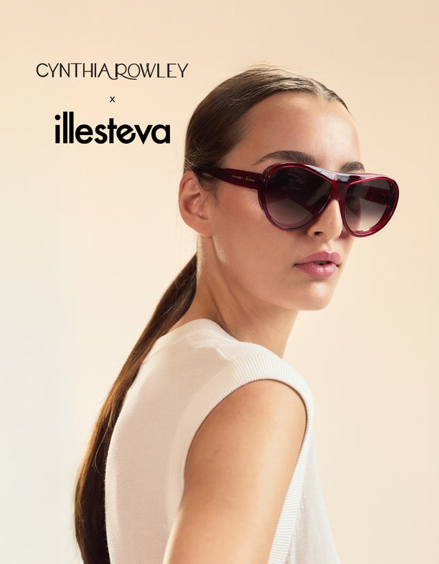 Woman in a white blouse wearing Cynthia Rowley x illesteva (narrow shot)