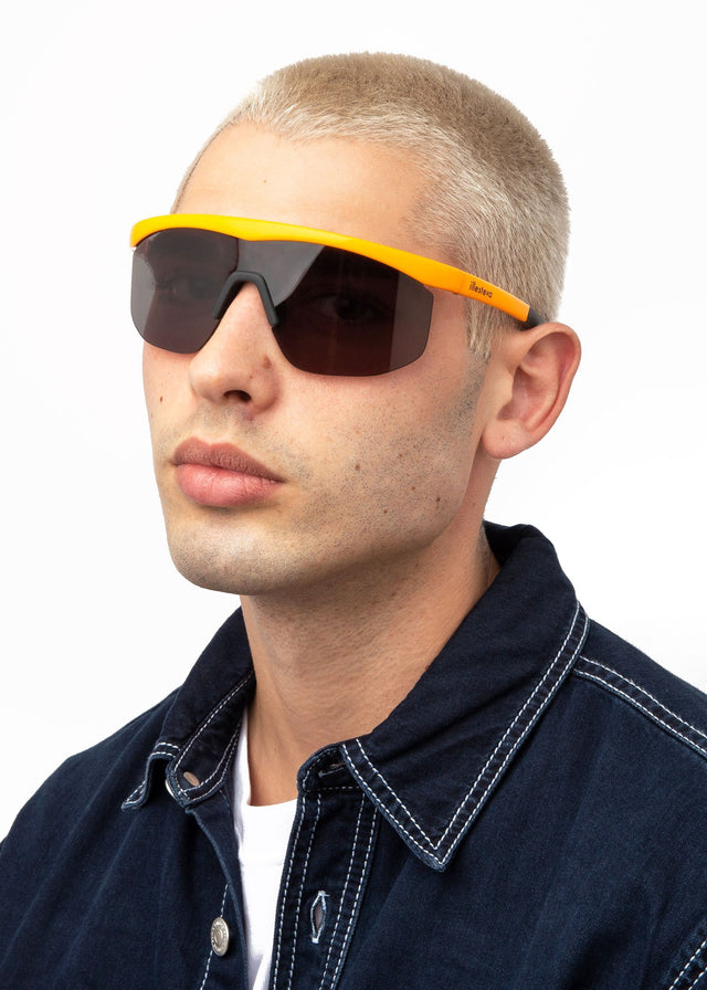 wearing Managua Sunglasses Neon Orange Grey