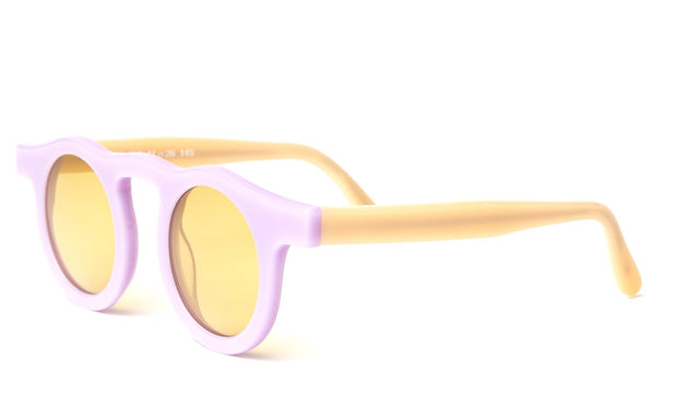 Marlene Sunglasses side view in Lilac/Creamsicle with Honey See Through Lenses
