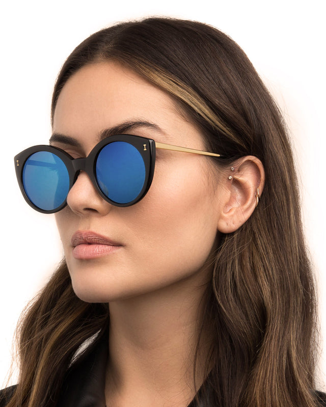 wearing Palm Beach Sunglasses Black Blue Mirror