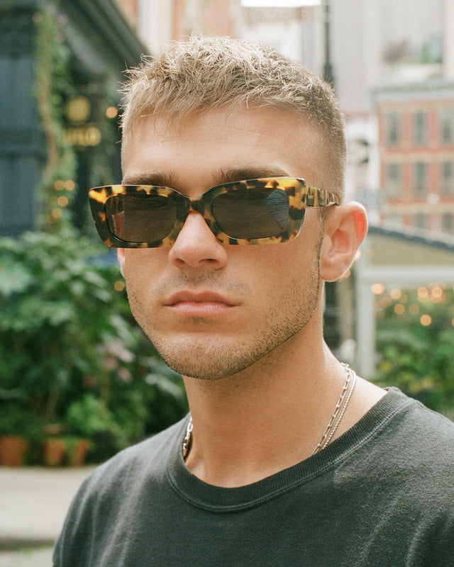 Blonde model with short hair wearing Wilson Sunglasses Tortoise with Grey Flat